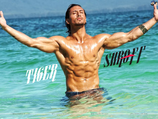 Man standing ocean arms outstretched - daryush shokof free wallpaper