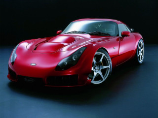 Red sports car studio photo 2 - a studio photo free wallpaper
