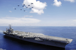 Large ship ocean jets flying 2 - a group of fighter jets free wallpaper