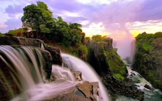 Waterfall sunset cascade cloudy sky - arthur quartley free wallpaper for desktop