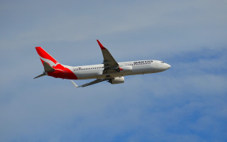 Large passenger jet blue sky - a red tail free wallpaper