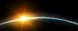 Sun shining earth space view 3 - a yellow light free wallpaper