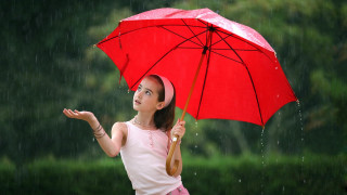 Woman umbrella rain hand side 2 - the side of her face free wallpaper