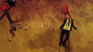 Man red mohawk wall clock - a man free wallpaper