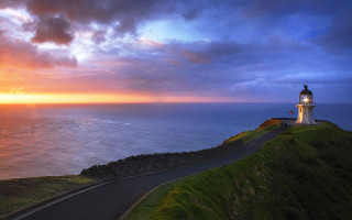Lighthouse hill ocean sunset cloudy - road free wallpaper
