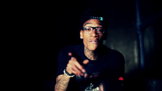 Man glasses pointing dark room - his hand out free wallpaper