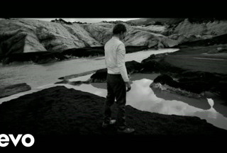 Man standing rocky hillside river - a river and mountains free wallpaper