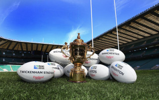 Trophy rugby balls field stadium - a stadium in the background free wallpaper