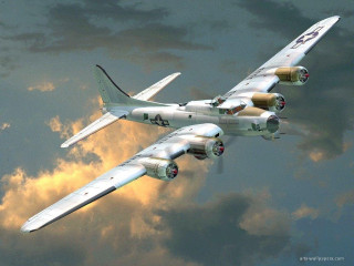 Large airplane flying cloudy sky - a large airplane free wallpaper