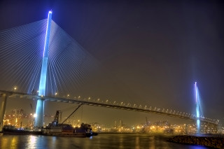 Large bridge river night lights - side and a boat free wallpaper