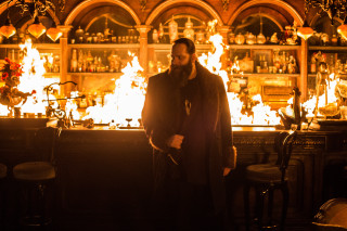 Man standing bar fire background - vfx free wallpaper