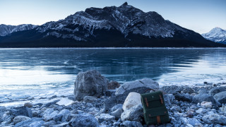 Suitcase rocky beach mountain lake - a mountain lake free wallpaper