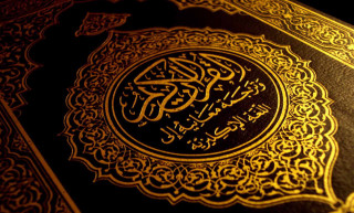 Book closeup gold black hurufiyya - a detailed drawing free wallpaper