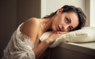 Woman pillow room window portrait - a window behind her free wallpaper
