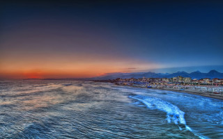 Beach sunset city waves bridge - wave free wallpaper