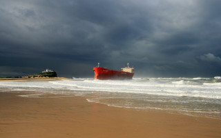 Large red boat beach ocean - australian tonalism free wallpaper
