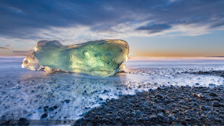 Iceberg beach sunset cloudy sky - a rocky beach next free wallpaper