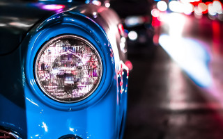 Blue car headlight shallow depth - a blue car free wallpaper