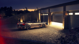 Sports car garage night city - a garage free wallpaper