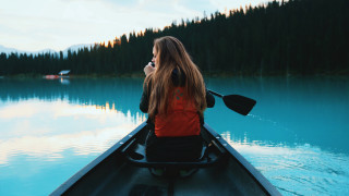 Woman red jacket canoe lake - a canoe free wallpaper