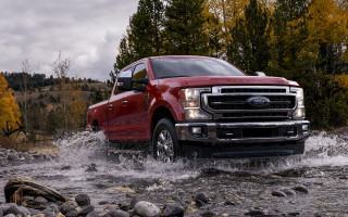 Red truck river rocks trees - a red truck free wallpaper