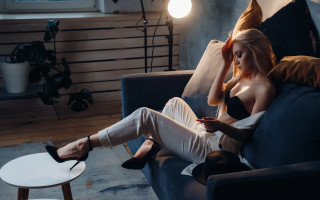 Woman sitting couch blonde highheels - artur tarnowski free wallpaper