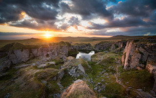 Lake rocky terrain sunset cityscape - neoromanticism free wallpaper