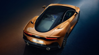 Gold sports car top view - a spotlight free wallpaper