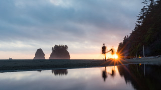 Beach sunset reflection mountains lens - a beach near the ocean free wallpaper