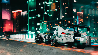 White car night city lights 2 - a city street free wallpaper