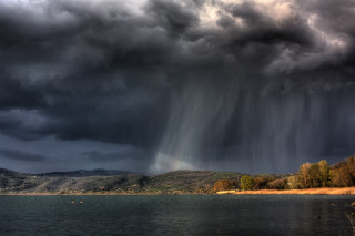 Storm lake mountains boat water - the water below free wallpaper