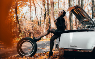 Woman black dress heels car - a tire free wallpaper