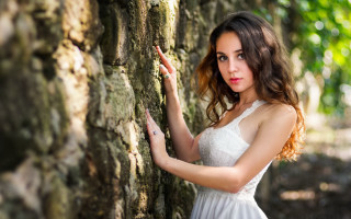 Woman white dress leaning wall 11 - against free wallpaper