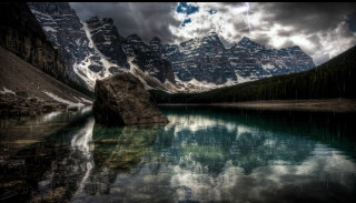 Mountain range lake clouds dark - a dark sky above free wallpaper