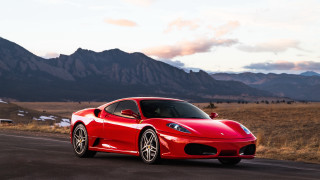 Red sports car mountains clouds 8 - bernardo cavallino free wallpaper