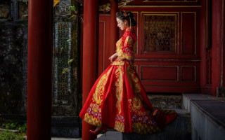 Woman red yellow dress red 2 - a red building free wallpaper