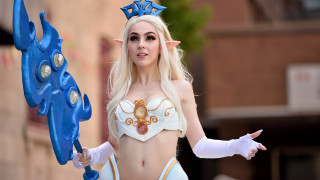 Renaissance elf woman blue object - the side of her body free wallpaper