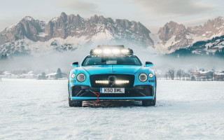 Blue car snow mountains fog - the air above free wallpaper