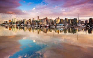 City skyline boats reflection cloudy - a reflection of the city free wallpaper