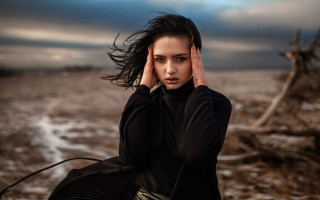 Woman blowing hair field cloudy - cloudy free wallpaper