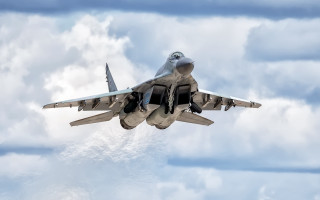Fighter jet cloudy sky engine - a jet engine free wallpaper