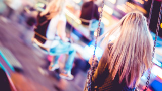 Carnival night swing blurry bokeh - other person free wallpaper