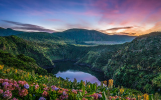 Sunset lake mountains flowers pink - a beautiful sunset over a lake free wallpaper