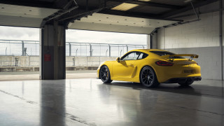Yellow sports car garage puzzle - a large window free wallpaper