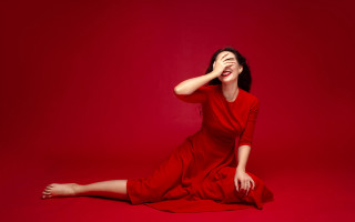 Woman red dress sitting portrait 2 - her eye free wallpaper