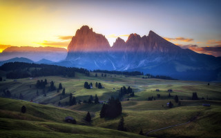 Mountain range sunset trees lake - a sunset in the background free wallpaper
