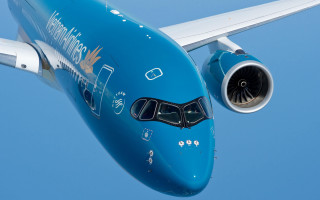 Large blue airplane flying jetengine - the side of the plane free wallpaper
