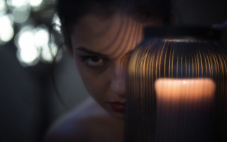 Woman lantern candle bokeh closeup - diffuse free wallpaper