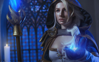Woman blue outfit sword candle - a stained glass window free wallpaper
