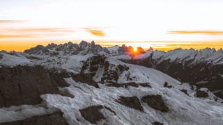 Skier mountain top sunset nature - a mountain top free wallpaper